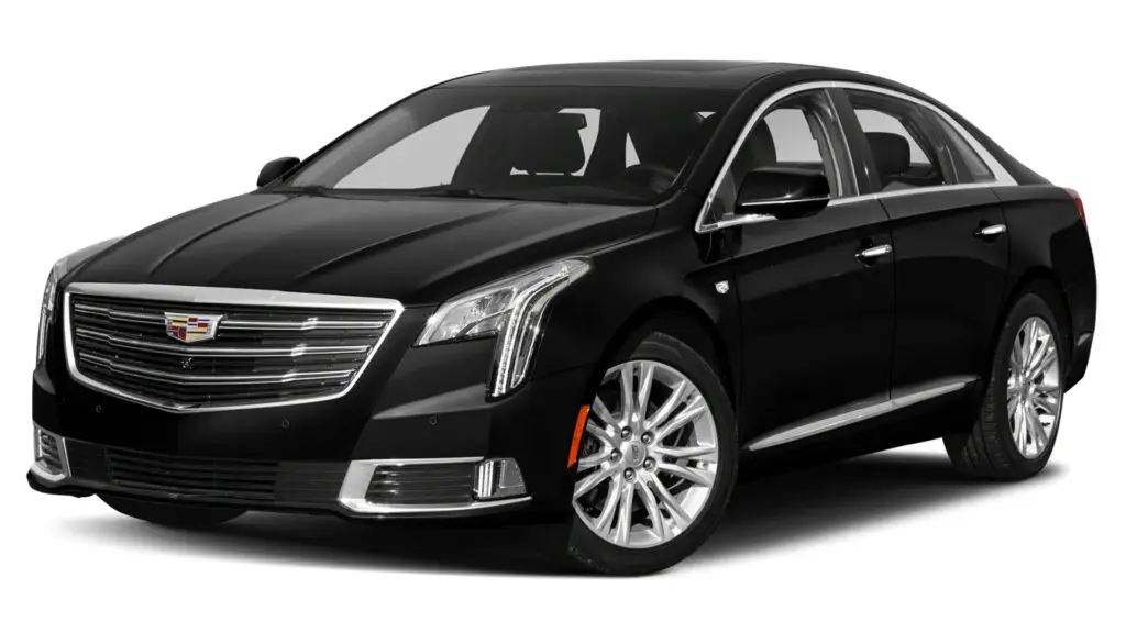 Chauffeur-driven black Cadillac XTS luxury sedan offering premium private car service and airport transfers from San Francisco to Napa Valley